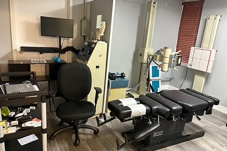 Chiropractic treatment room with adjustment table