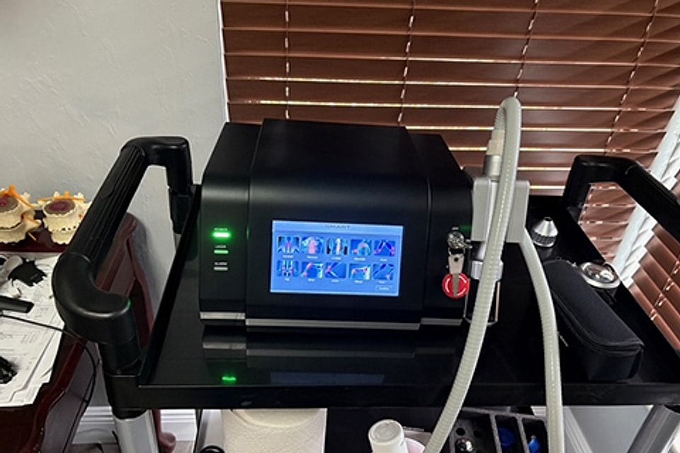 Shockwave therapy device on a treatment cart